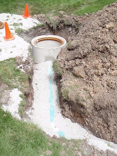 Bob's Grading installed this 6" PVC to drain the catch basin.